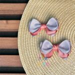 گیره-موی-پاپیونی-دخترانه-رنگی-صورتی-طوسی