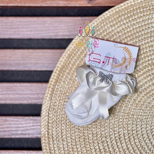 جوراب-نوزادی-دخترانه-پاپیونی-روبان-دار-شیری جوراب-نوزادی-دخترانه-پاپیونی-روبان-دار-شیری