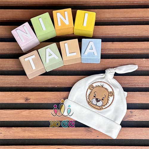 کلاه-گرهی-نوزادی-اسپرت-طرح-شیر-مهربان-شیری