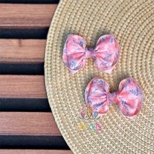 گیره-موی-پاپیونی-دخترانه-طرح-گل-حریر-صورتی